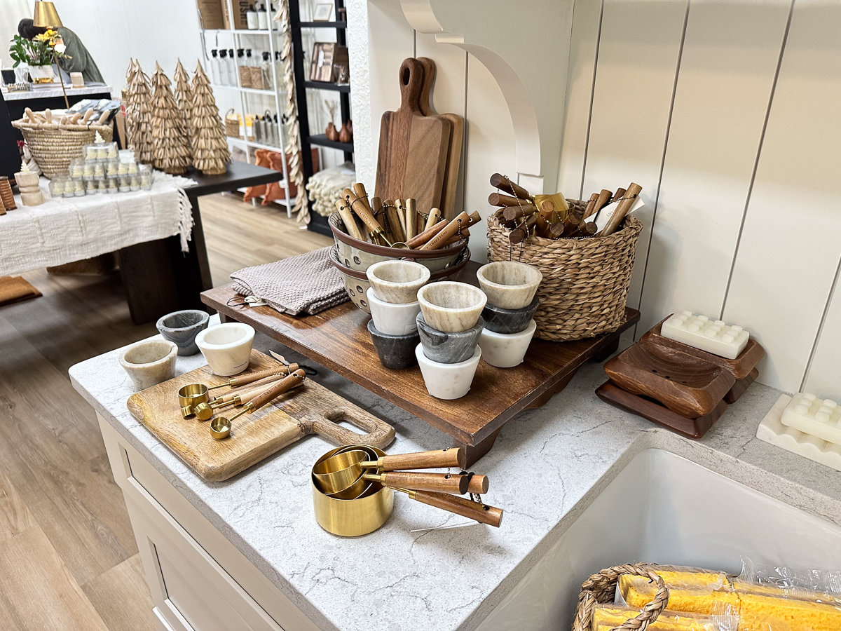 various modern kitchen items in brown and gold
